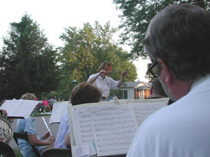 Carol conducting